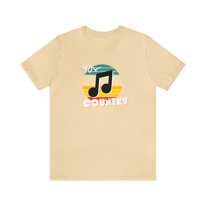 cream colored tshirt that says "90s country" with a music note and colorful background