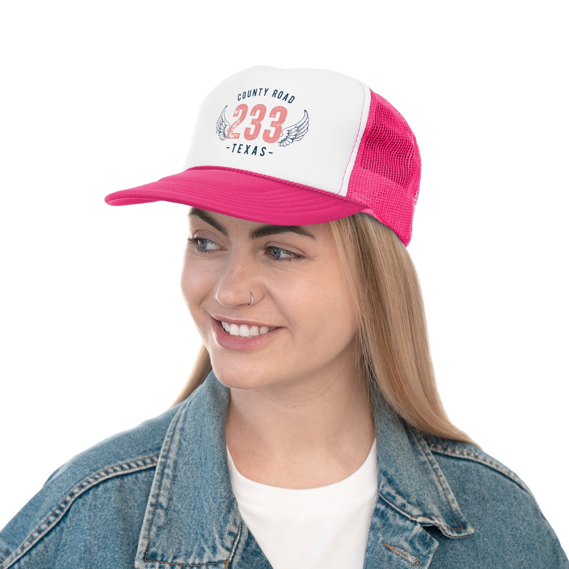 woman wearing county road 233 trucker hat