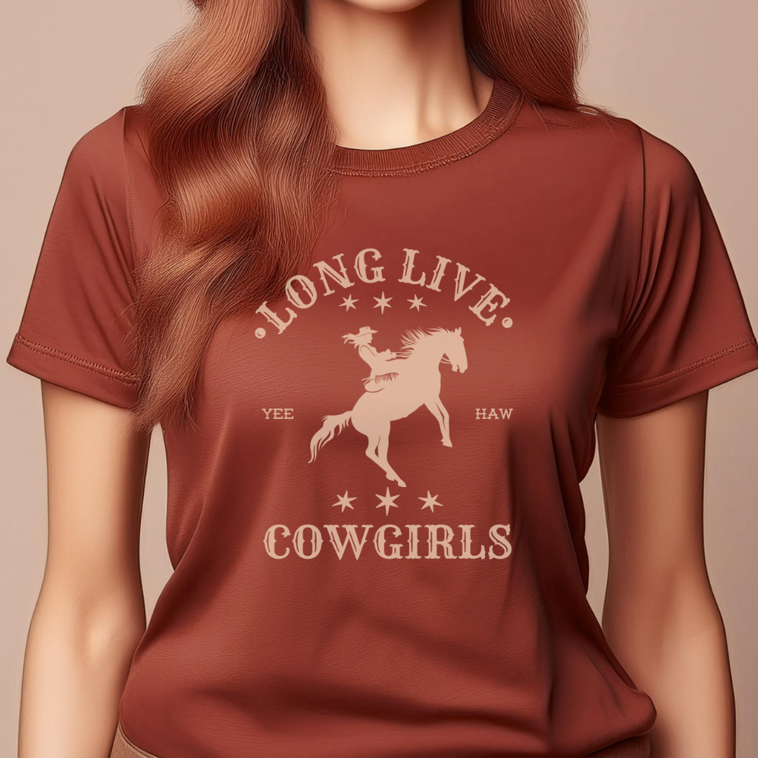 woman wearing a "long live cowgirls" t-shirt in the color autumn